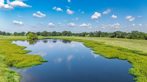 a view of a lake in a city