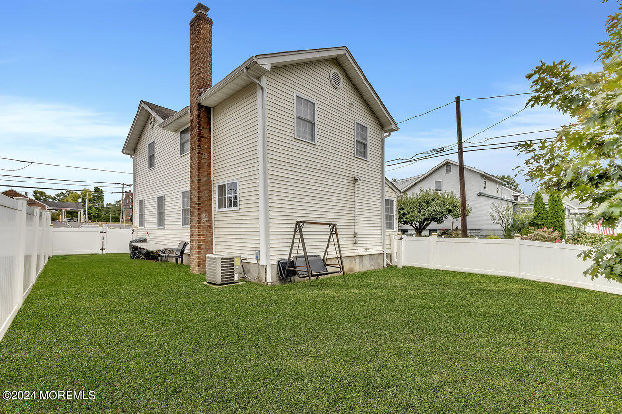 164 Jackson Street Matawan, NJ 07747 - Photo 23 of 26 a view of a house with a yard and deck
