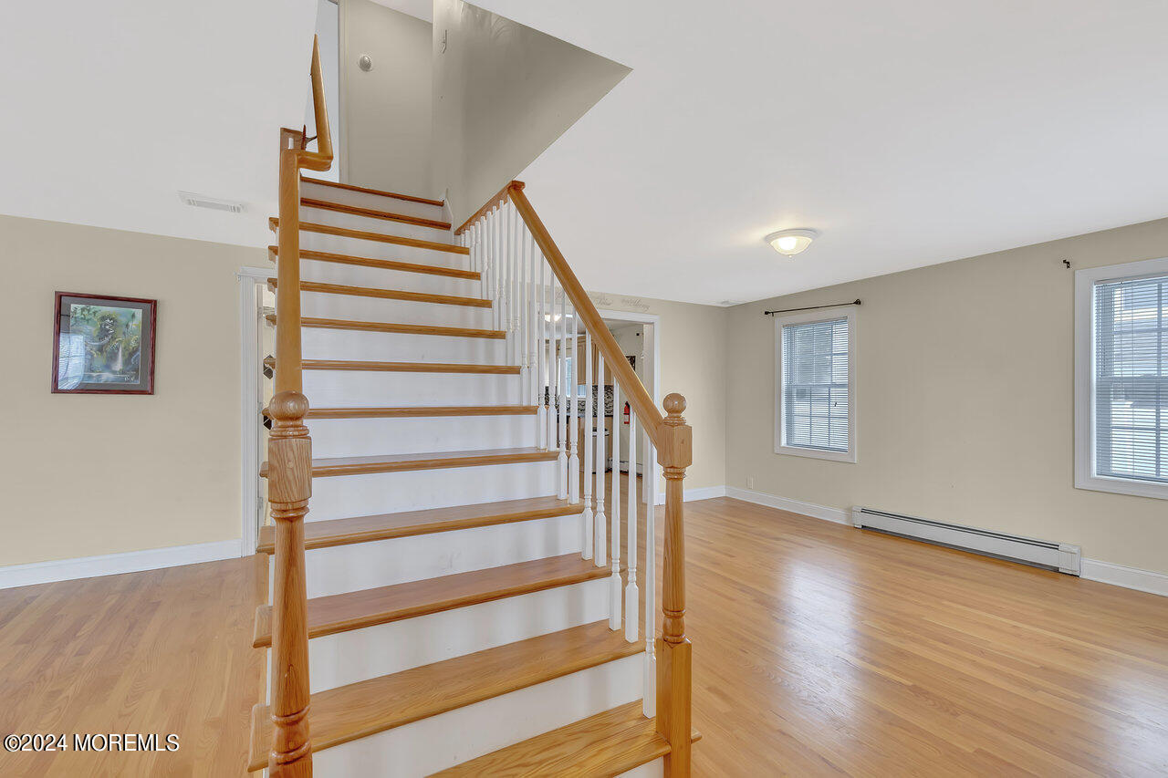 164 Jackson Street Matawan, NJ 07747 - Photo 7 of 26 a view of entryway with wooden floor