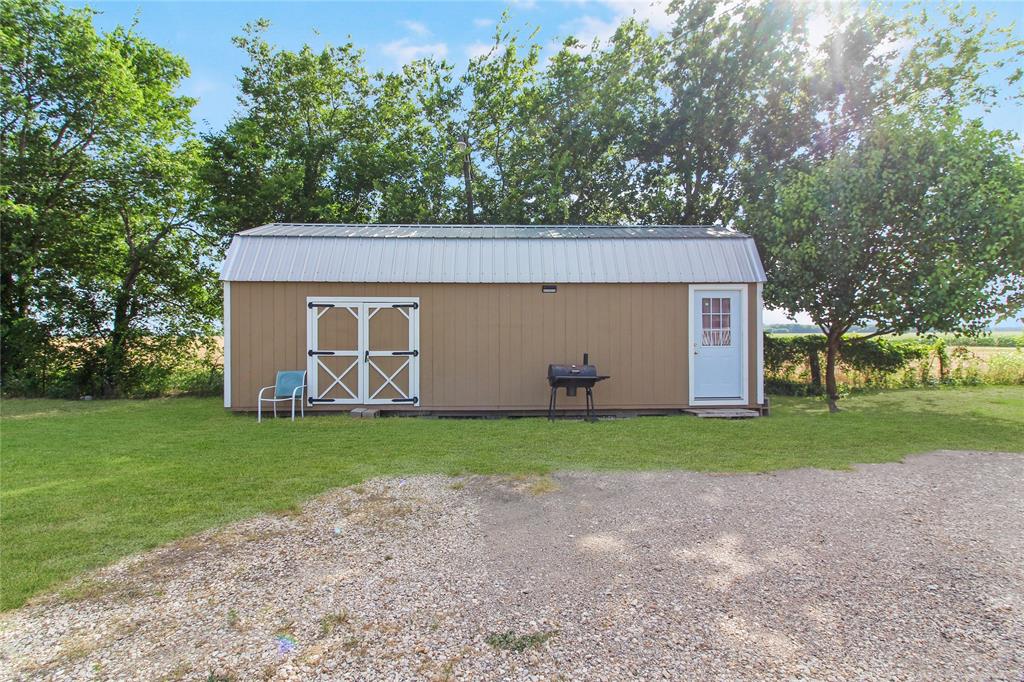 455 Hughes Cemetery Road Italy, TX 76651 - Photo 35 of 40 a house view with a backyard space