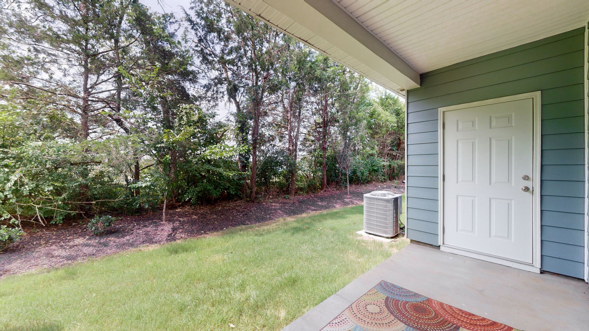 174 Cecil Road Lebanon, TN 37087 - Photo 32 of 50 Private back covered patio with additional exterior storage and private tree lined view