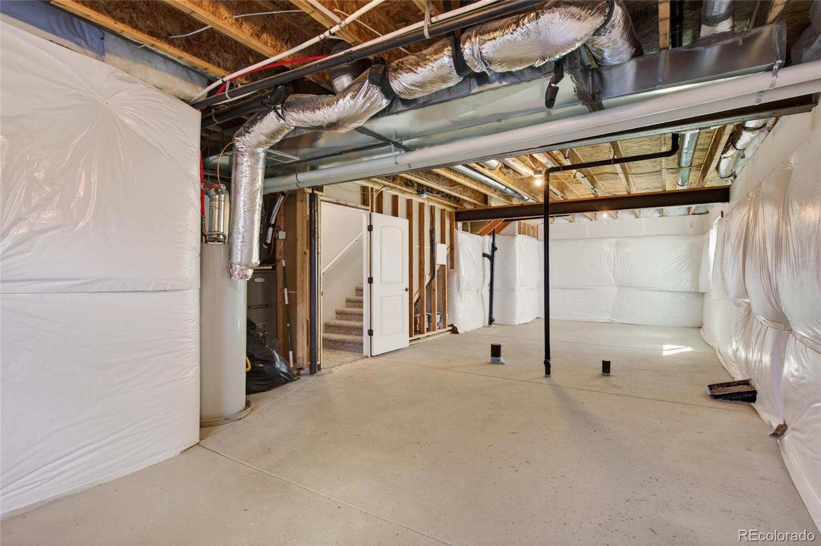 10436 17th Street Greeley, CO 80634 - Photo 16 of 18 a view of a room with wooden floor