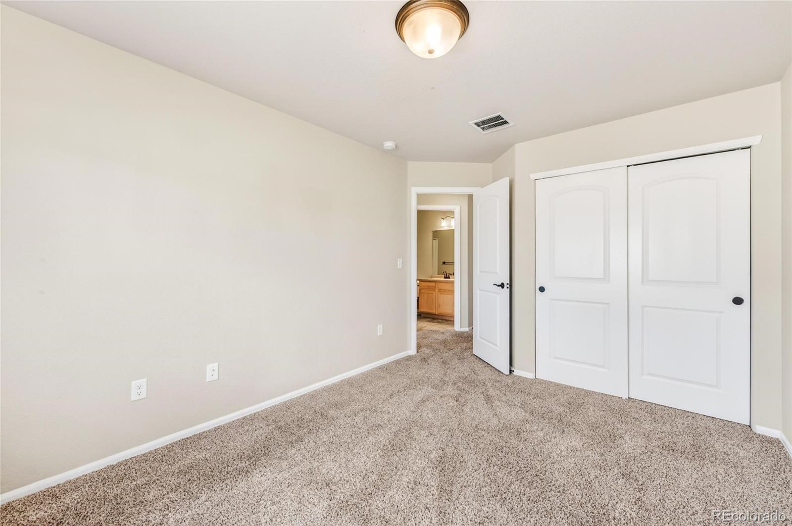 10436 17th Street Greeley, CO 80634 - Photo 6 of 18 a view of an empty room