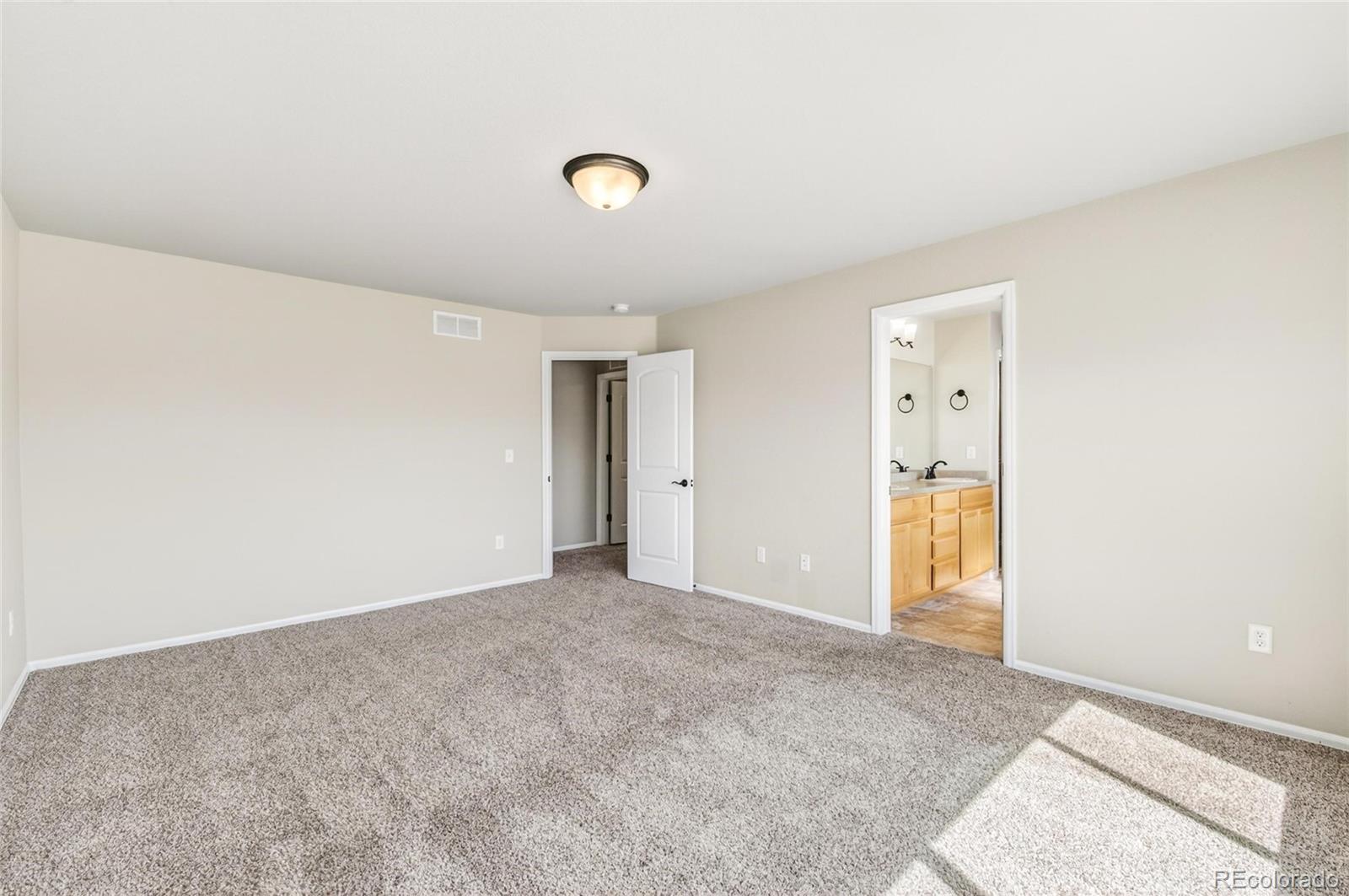10436 17th Street Greeley, CO 80634 - Photo 10 of 18 a view of an empty room