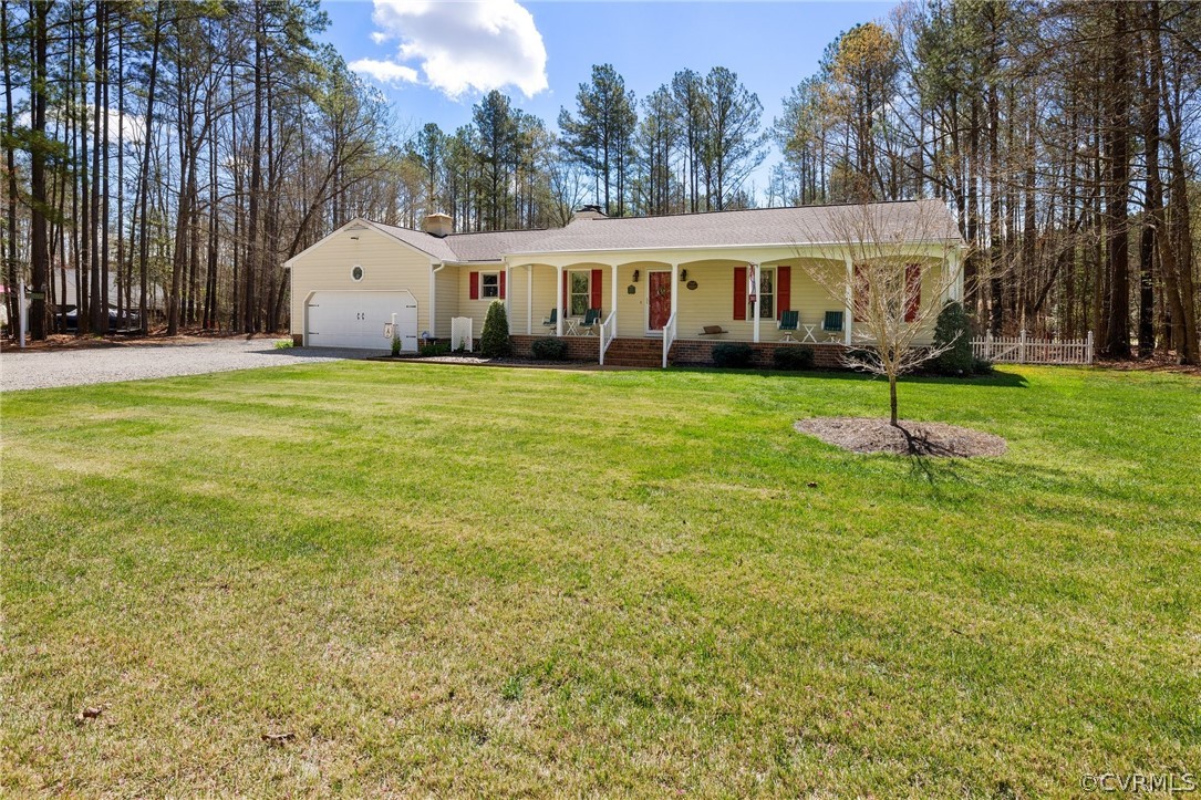 9221 Cattail Road Chesterfield, VA 23838 - Photo 2 of 34 a view of a house with a yard