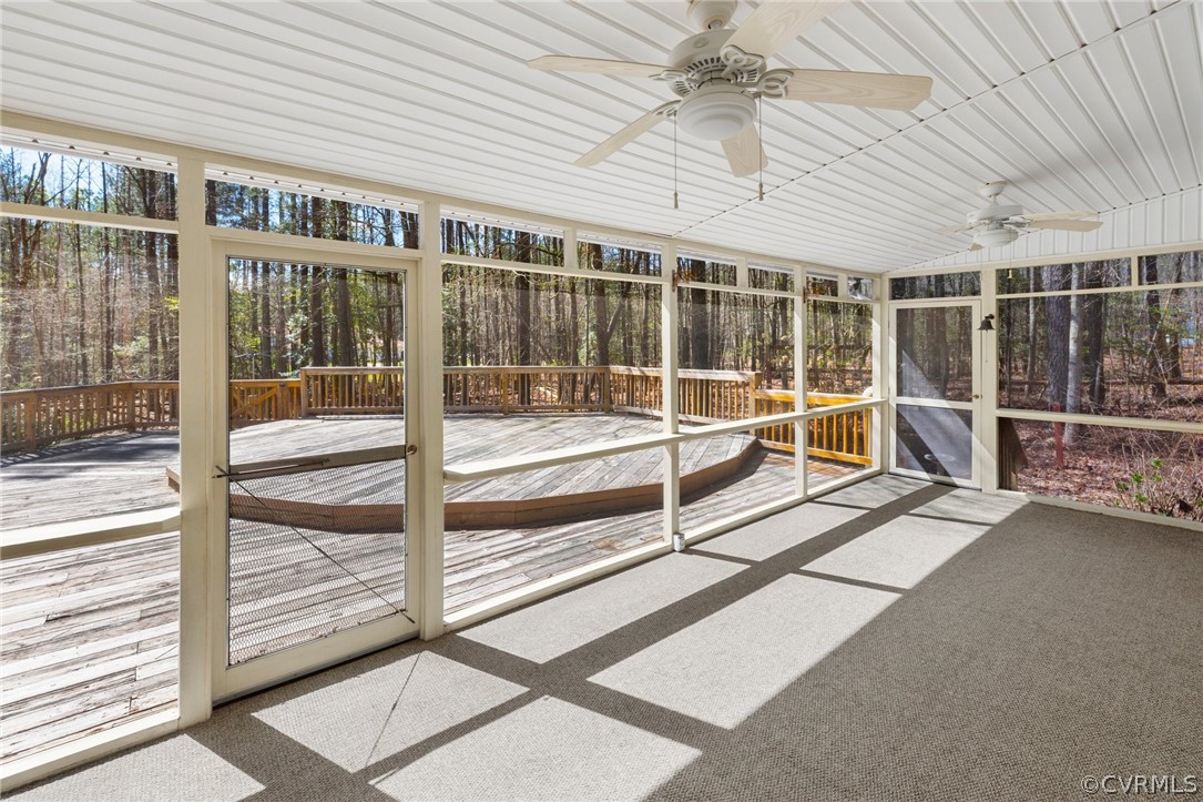 9221 Cattail Road Chesterfield, VA 23838 - Photo 24 of 34 a view of a house with a floor to ceiling windows and a table