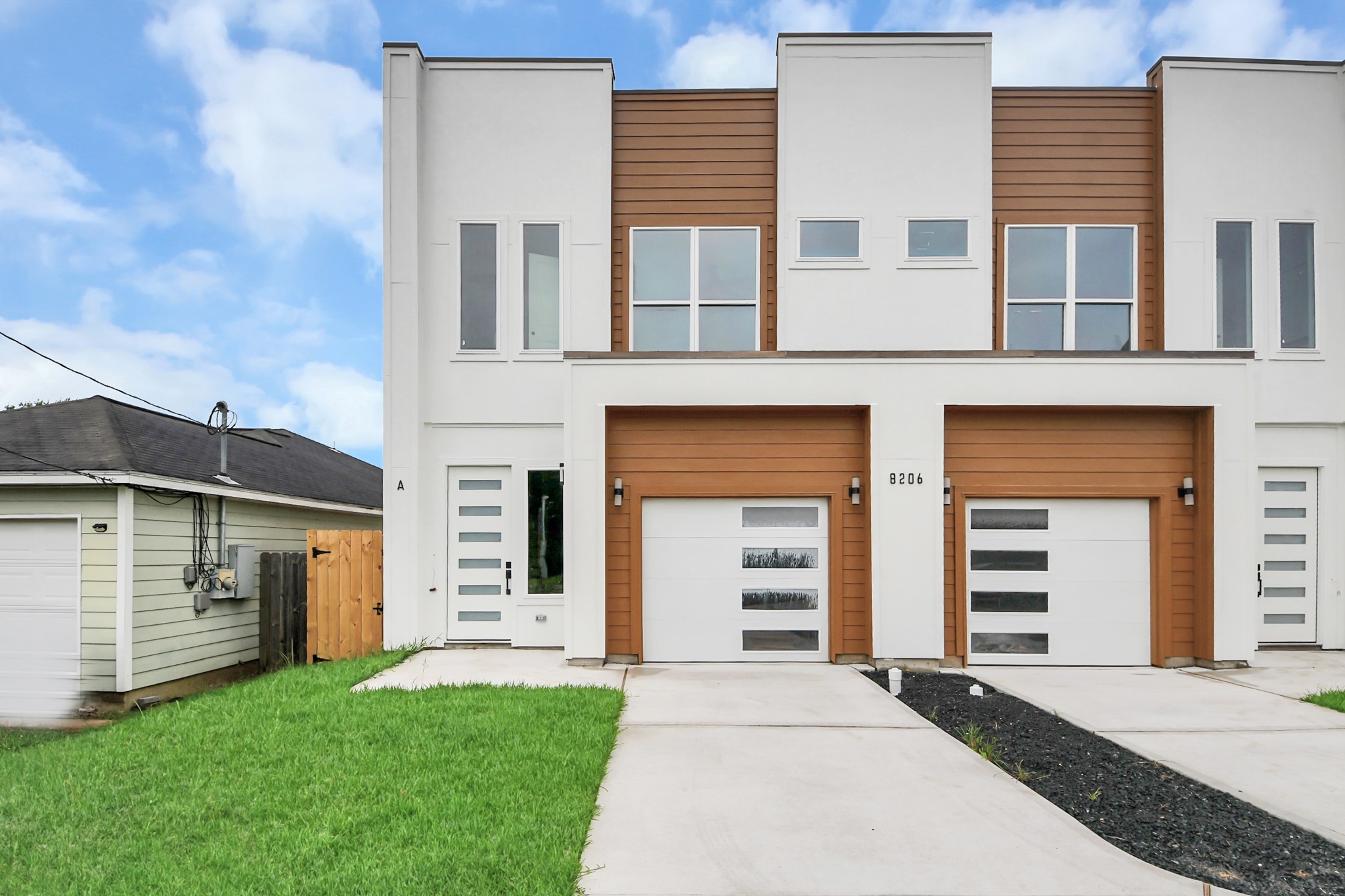 8206 Colonial Lane Houston, TX 77051 - Photo 2 of 31 a front view of a house with a yard