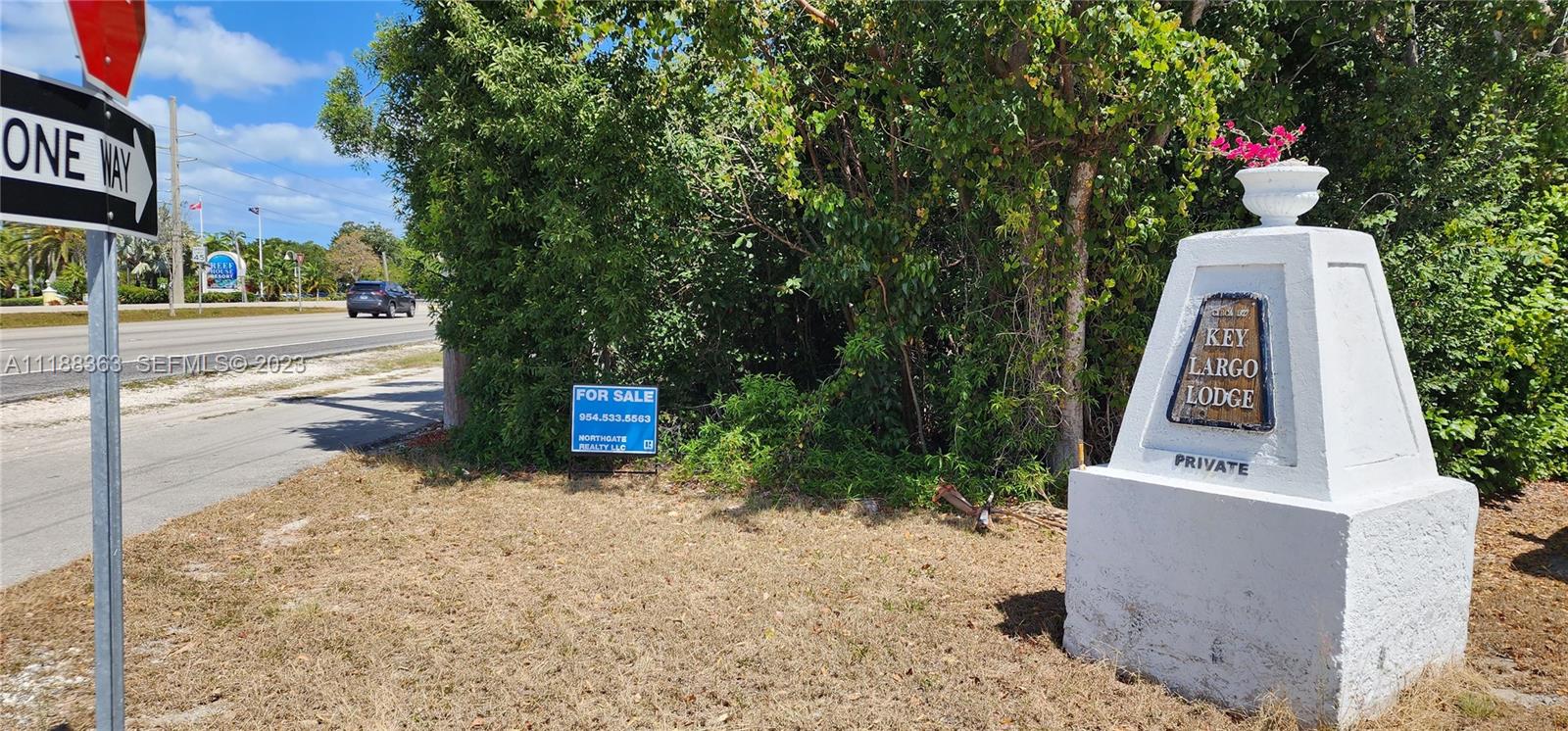 Key Largo Key Largo, FL 33037 - Photo 5 of 8 a front view of a house with a yard