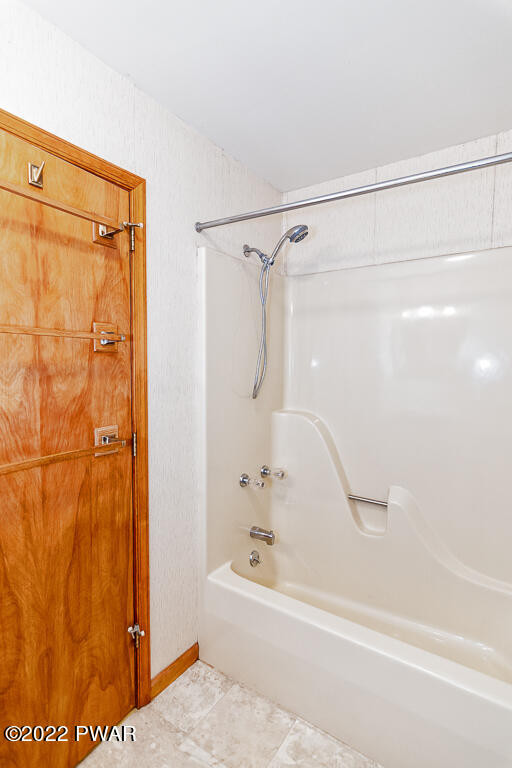166 Devils Hole Road Cresco, PA 18326 - Photo 27 of 46 a bathroom with a shower and a bath tub