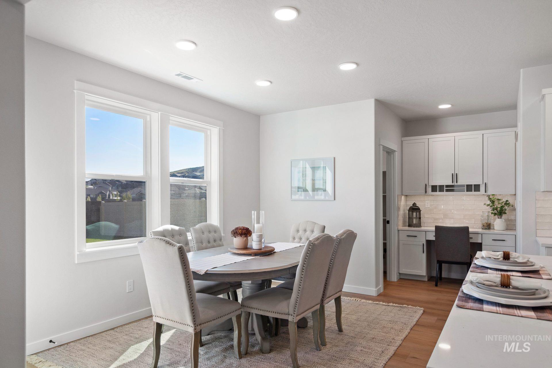 802 Coral Road Kimberly, ID 83341 - Photo 5 of 29 Dining space featuring recessed lighting and light wood-type flooring