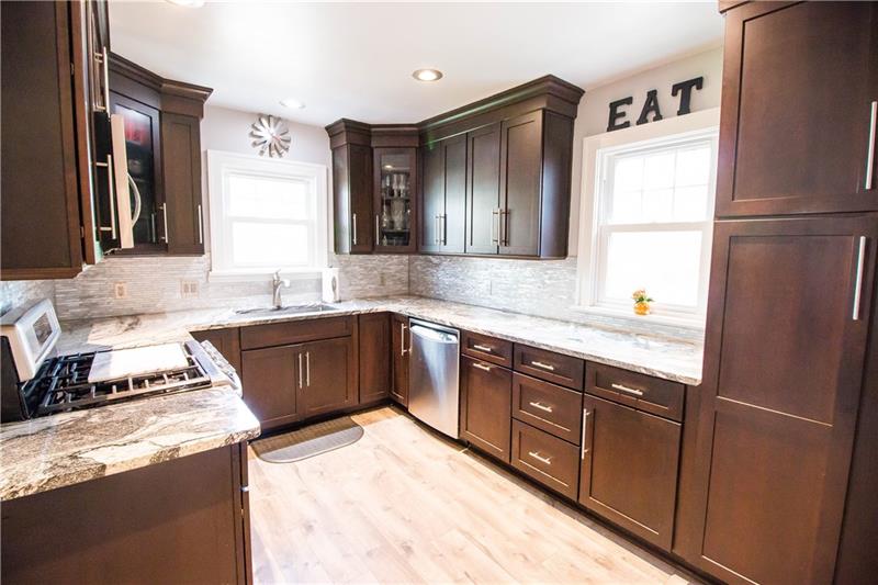 141 Oakville Road Beaver Falls, PA 15010 - Photo 9 of 24 Beautiful Kitchen with espresso cabinets, granite and stainless appliances
