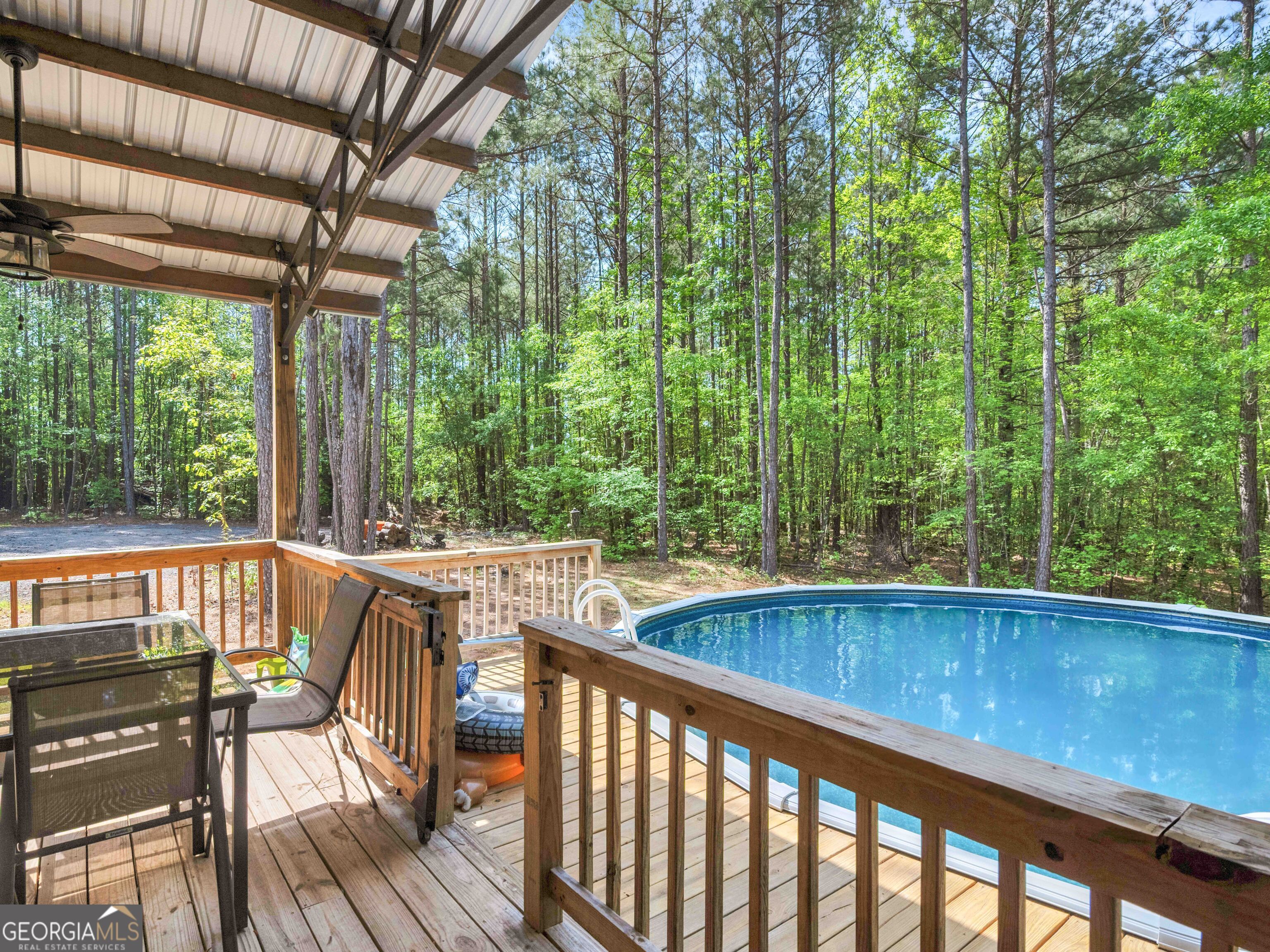 180 Preservation Avenue Jackson, GA 30233 - Photo 24 of 27 a view of a two chairs in the roof deck
