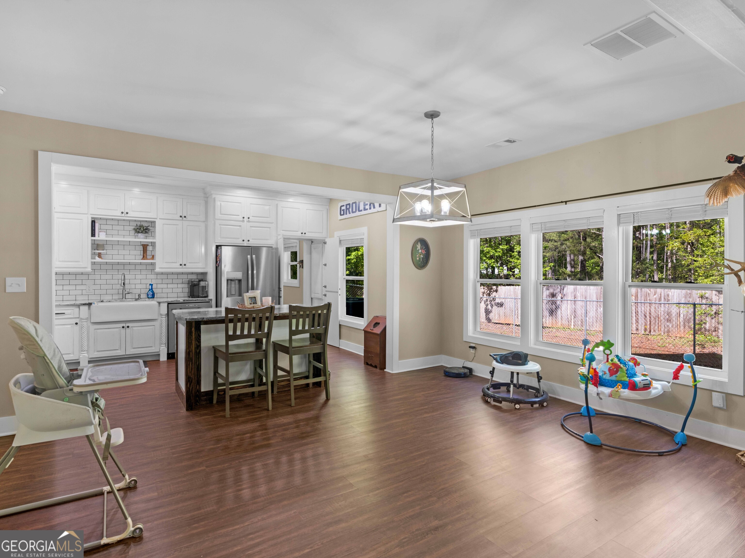 180 Preservation Avenue Jackson, GA 30233 - Photo 6 of 27 a living room with furniture and wooden floor
