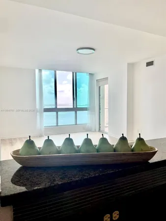 a bathroom with a bathtub and a toilet