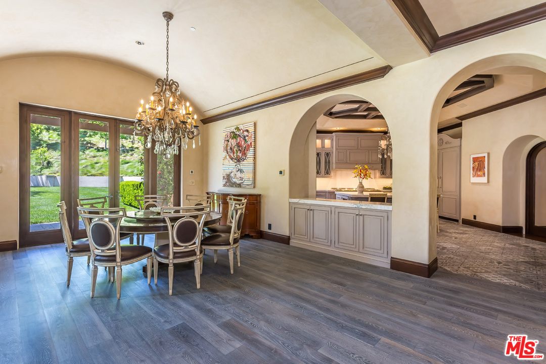 44 Beverly Park Circle Beverly Hills, CA 90210 - Photo 14 of 52 a view of a dining room with furniture window and wooden floor