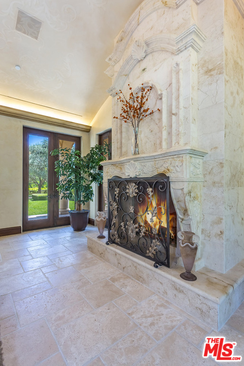 44 Beverly Park Circle Beverly Hills, CA 90210 - Photo 20 of 52 a view of an empty room and fire place