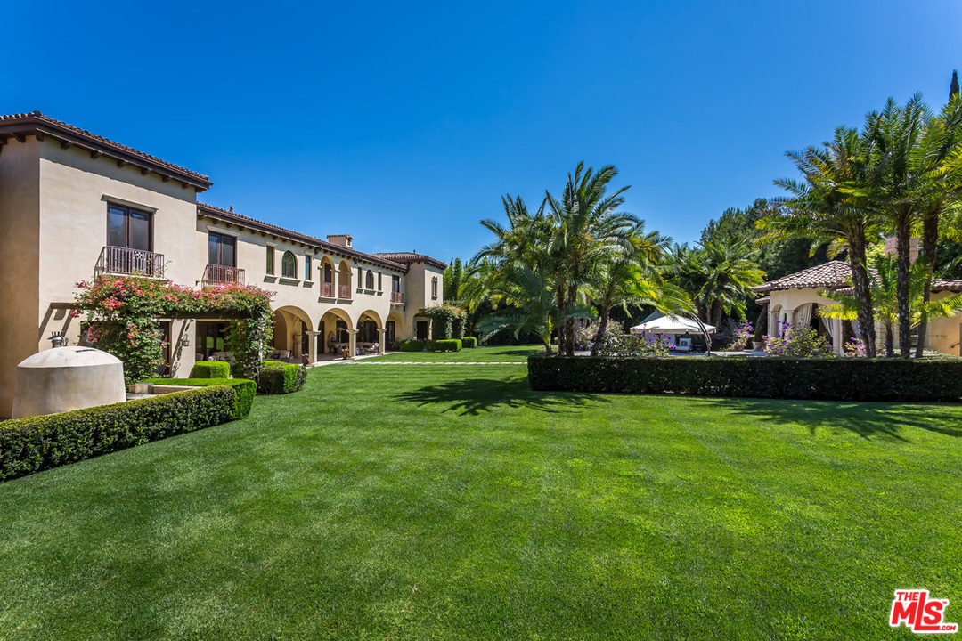 44 Beverly Park Circle Beverly Hills, CA 90210 - Photo 40 of 52 a front view of a house with a yard
