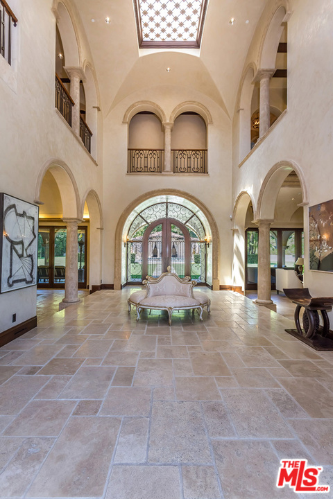 44 Beverly Park Circle Beverly Hills, CA 90210 - Photo 7 of 52 a view of a building with a garden