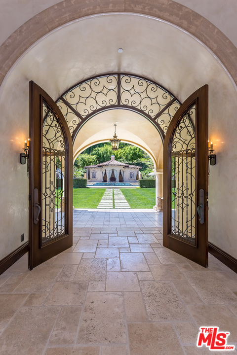 44 Beverly Park Circle Beverly Hills, CA 90210 - Photo 9 of 52 a view of an entryway with a garden
