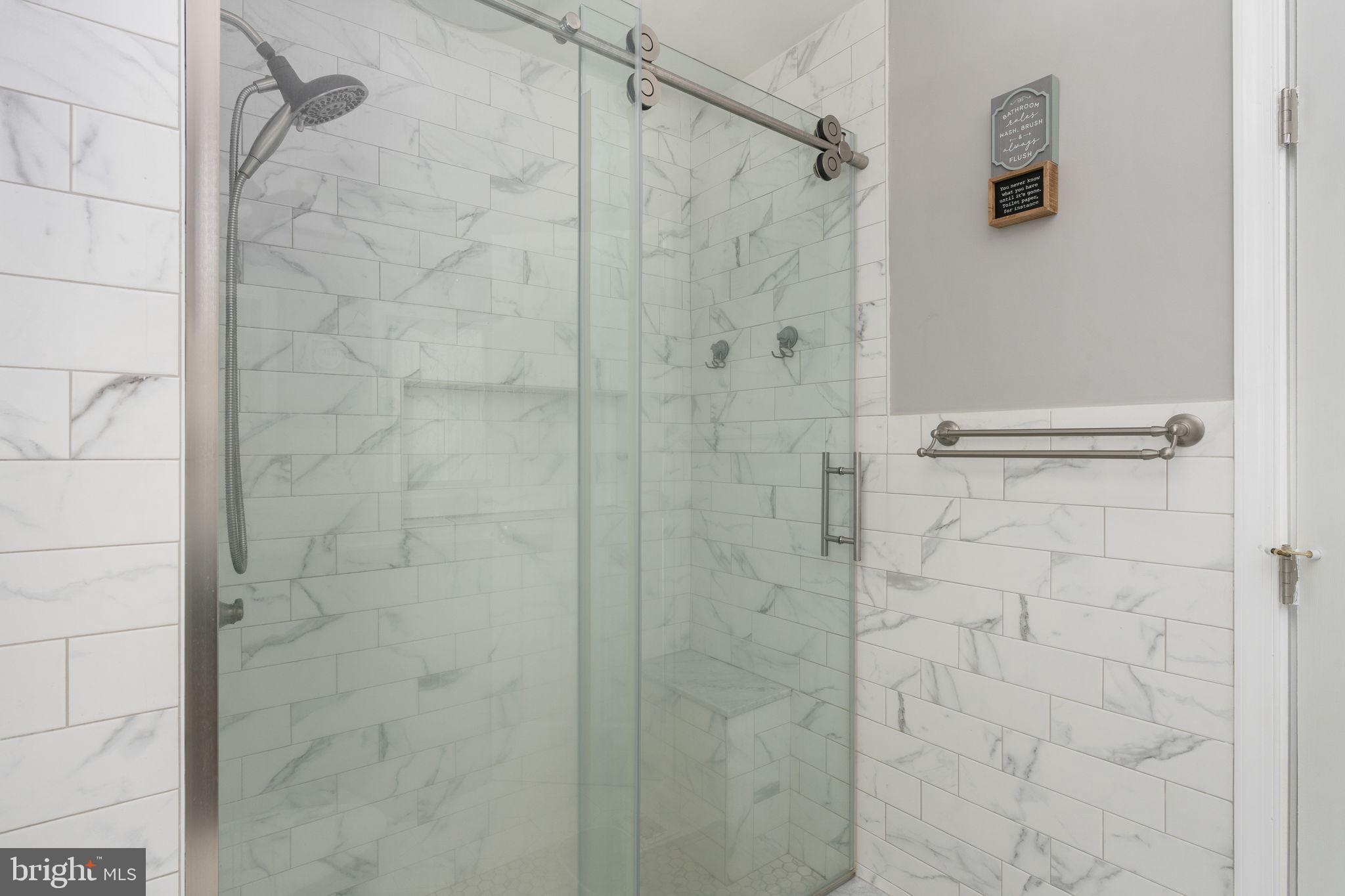 8009 Burrell Road Fredericksburg, VA 22407 - Photo 26 of 66 Sleek glass shower in modern design.