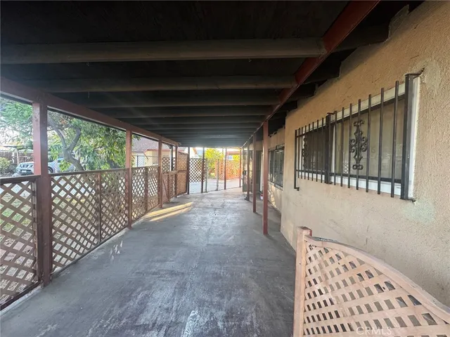a view of hallway with wooden floor