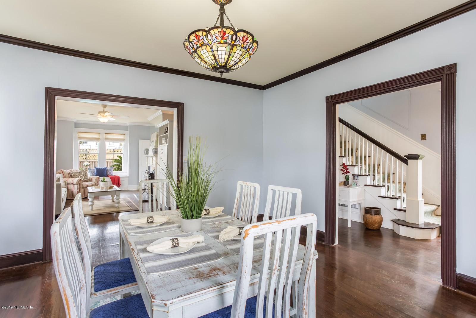 1620 Cherry Street Jacksonville, FL 32205 - Photo 13 of 34 a view of a dining room with furniture wooden floor and a chandelier