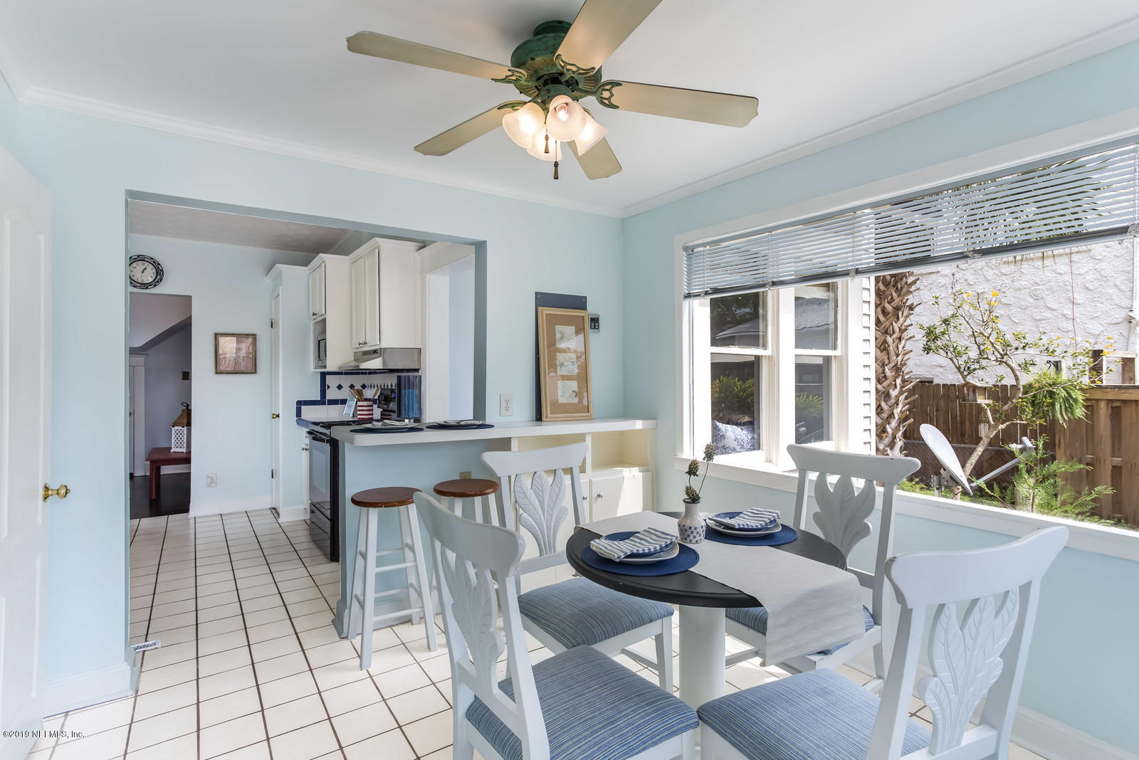 1620 Cherry Street Jacksonville, FL 32205 - Photo 25 of 34 a living room with stainless steel appliances kitchen island granite countertop furniture and a large window
