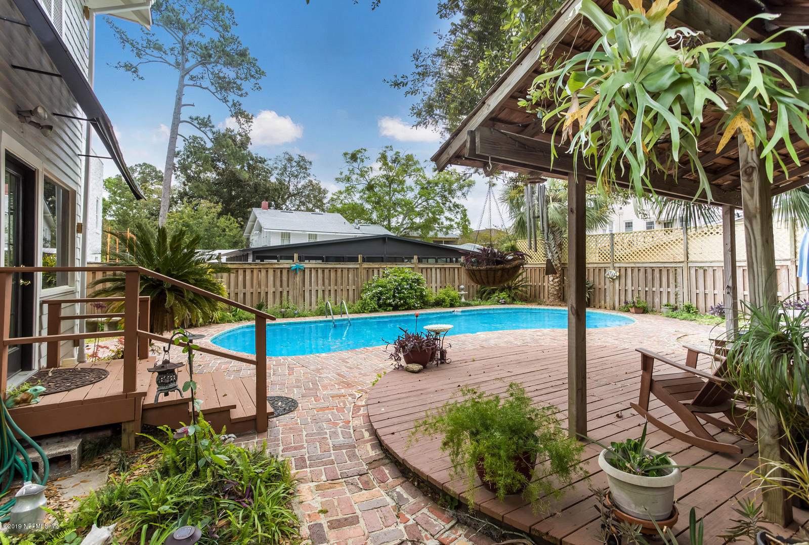 1620 Cherry Street Jacksonville, FL 32205 - Photo 4 of 34 a view of yard from deck with patio