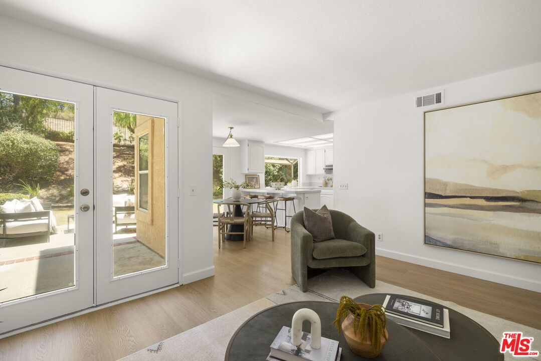 566 Innwood Road Simi Valley, CA 93065 - Photo 6 of 34 a living room with furniture and a large window