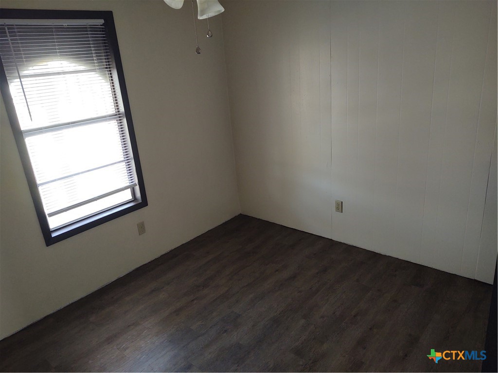 200-220 Quail Run Road Martindale, TX 78655 - Photo 4 of 16 an empty room with a window