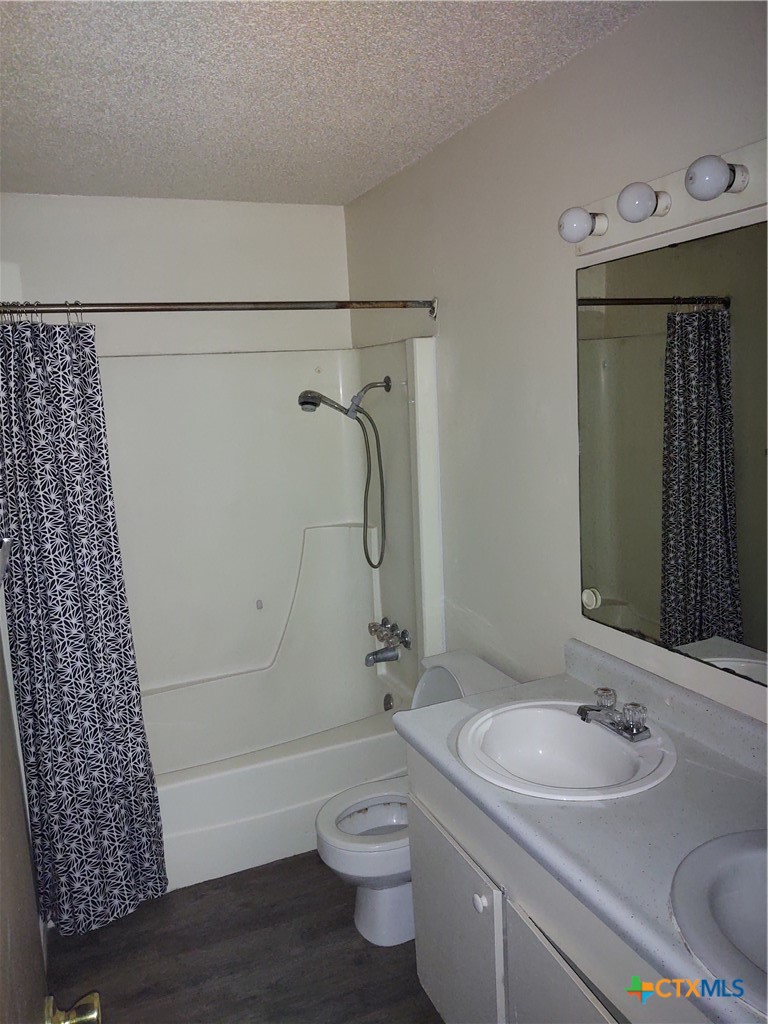 200-220 Quail Run Road Martindale, TX 78655 - Photo 6 of 16 a bathroom with a sink a toilet and shower