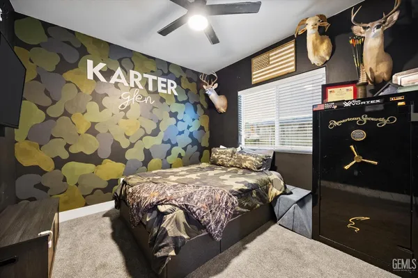 a bedroom with a bed and a cabinets