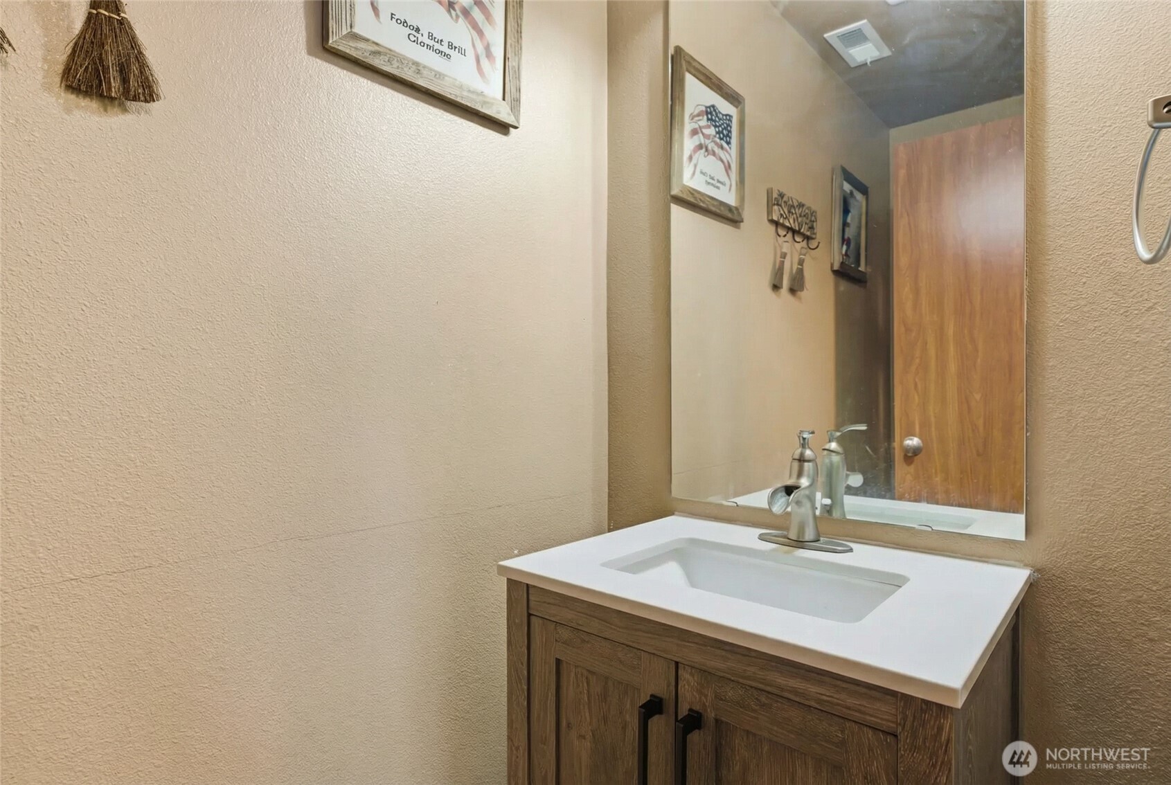 14839 99th Way Southeast Yelm, WA 98597 - Photo 11 of 31 a bathroom with a sink and a mirror