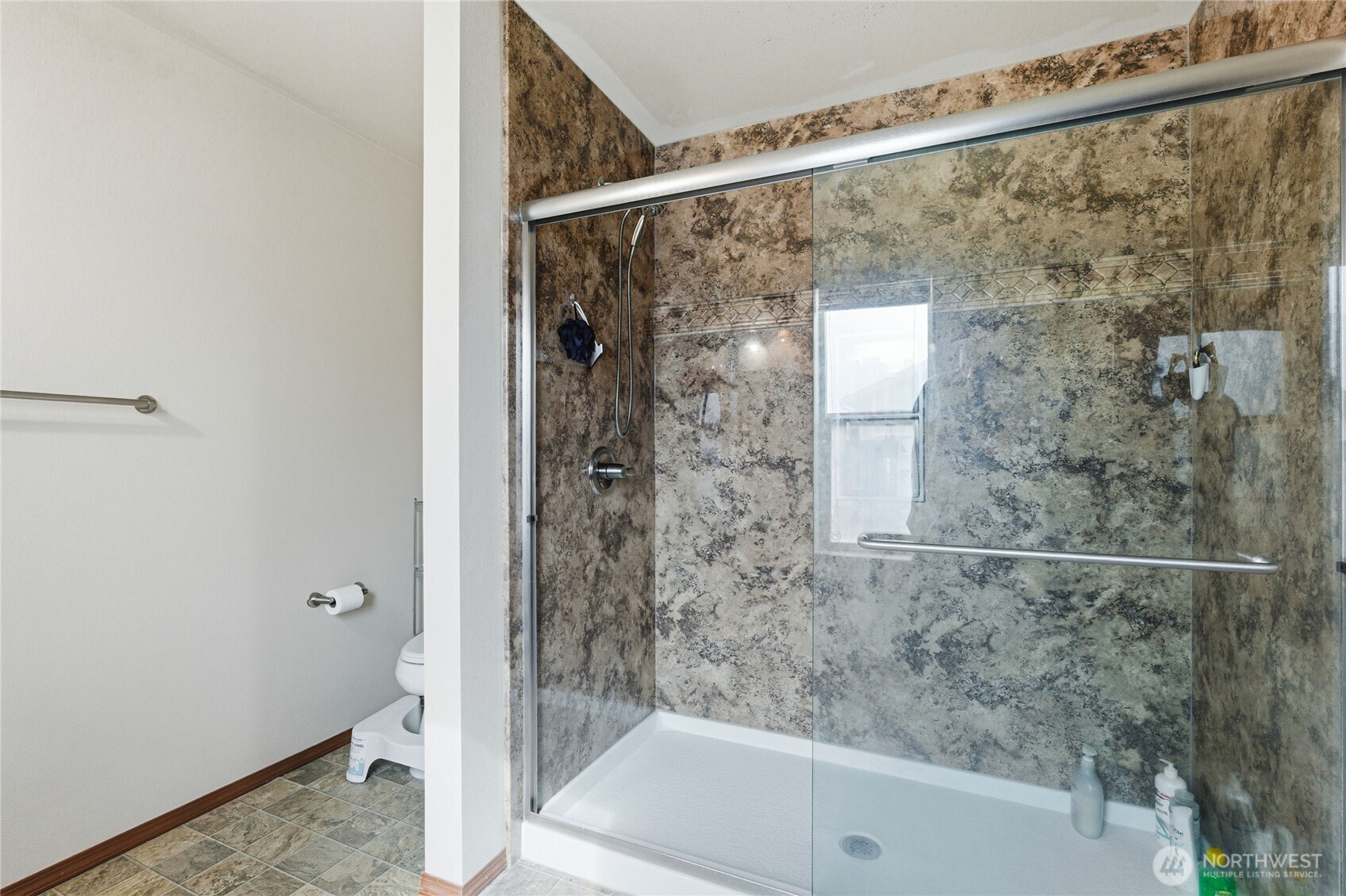 14839 99th Way Southeast Yelm, WA 98597 - Photo 19 of 31 a bathroom with a shower and a sink