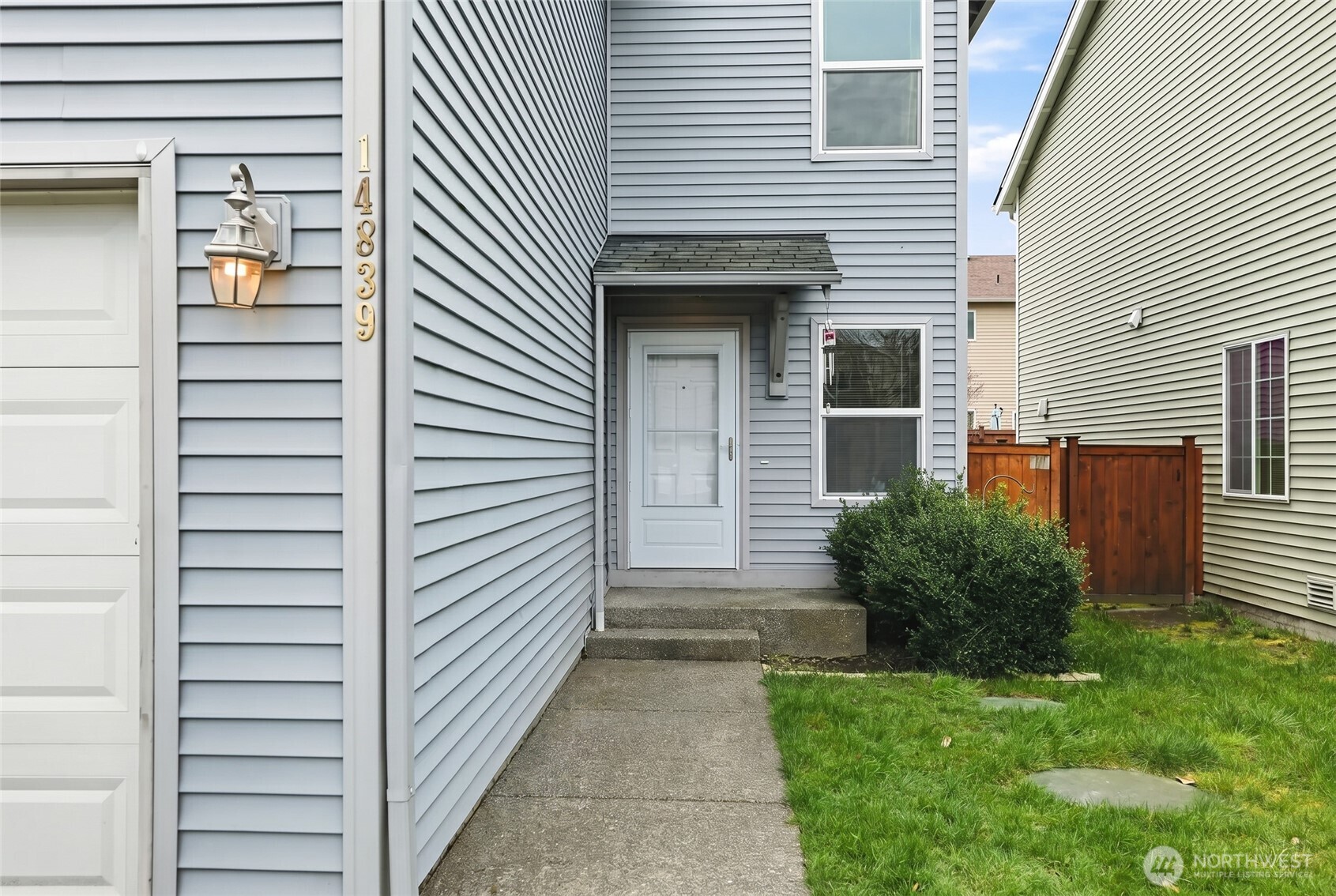 14839 99th Way Southeast Yelm, WA 98597 - Photo 2 of 31 a view of a back side of house