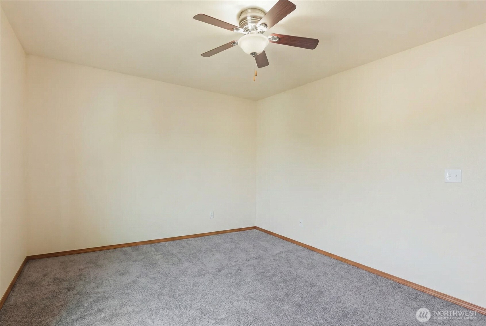 14839 99th Way Southeast Yelm, WA 98597 - Photo 22 of 31 an empty room with a fan and a fan