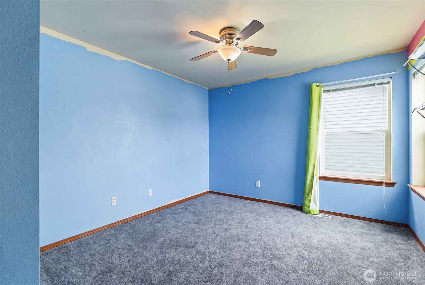 14839 99th Way Southeast Yelm, WA 98597 - Photo 25 of 31 an empty room with windows and fan