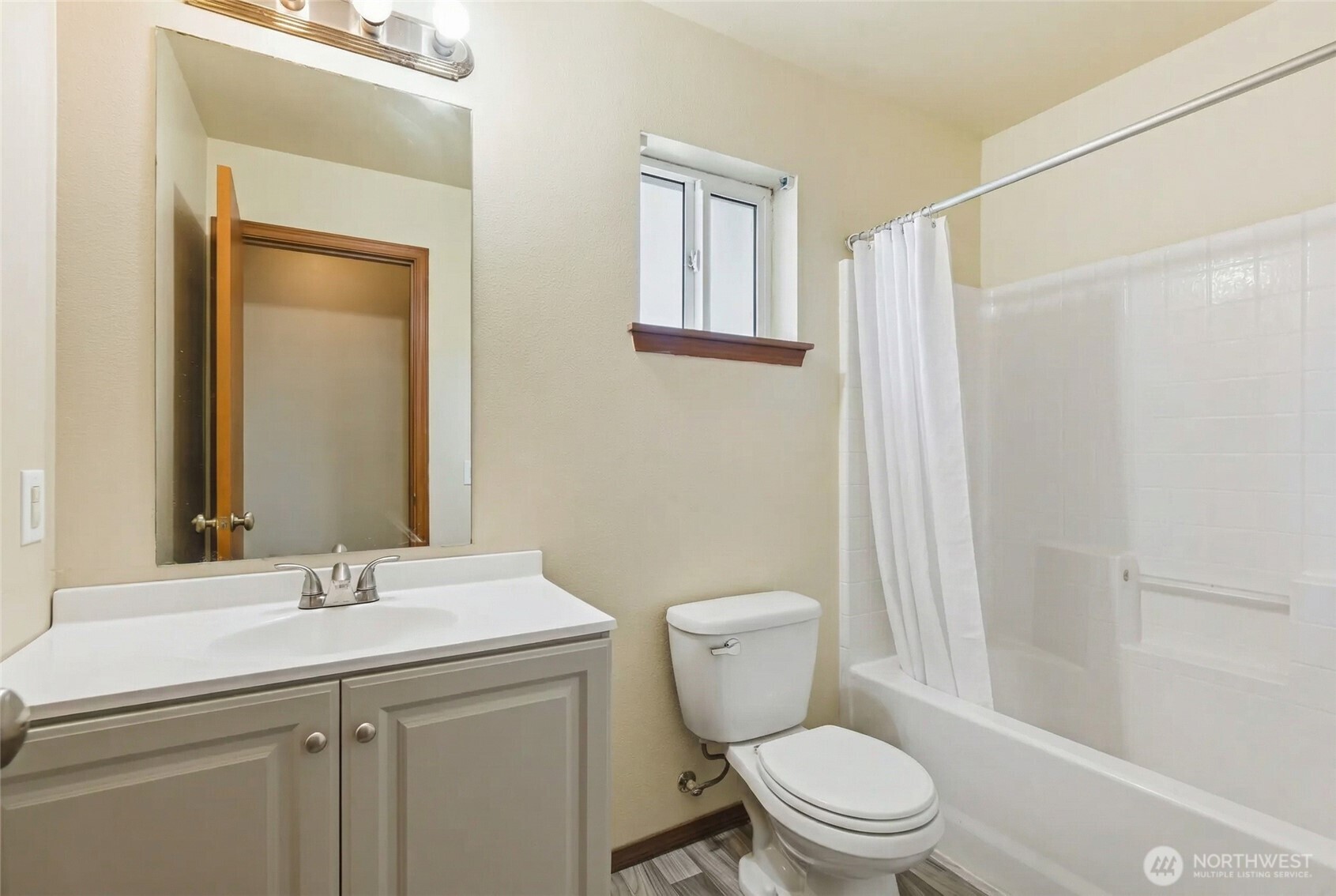 14839 99th Way Southeast Yelm, WA 98597 - Photo 27 of 31 a bathroom with a sink a toilet and shower