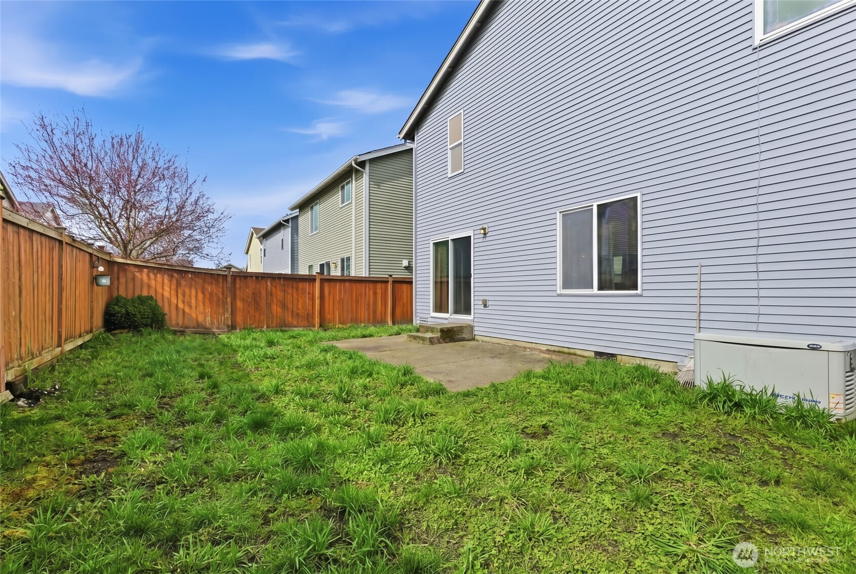 14839 99th Way Southeast Yelm, WA 98597 - Photo 29 of 31 a backyard of a house with lots of green space