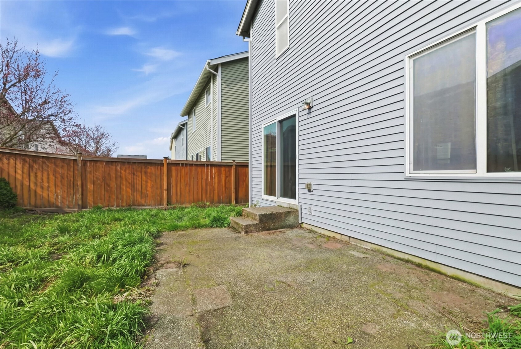 14839 99th Way Southeast Yelm, WA 98597 - Photo 30 of 31 a view of a backyard with wooden fence