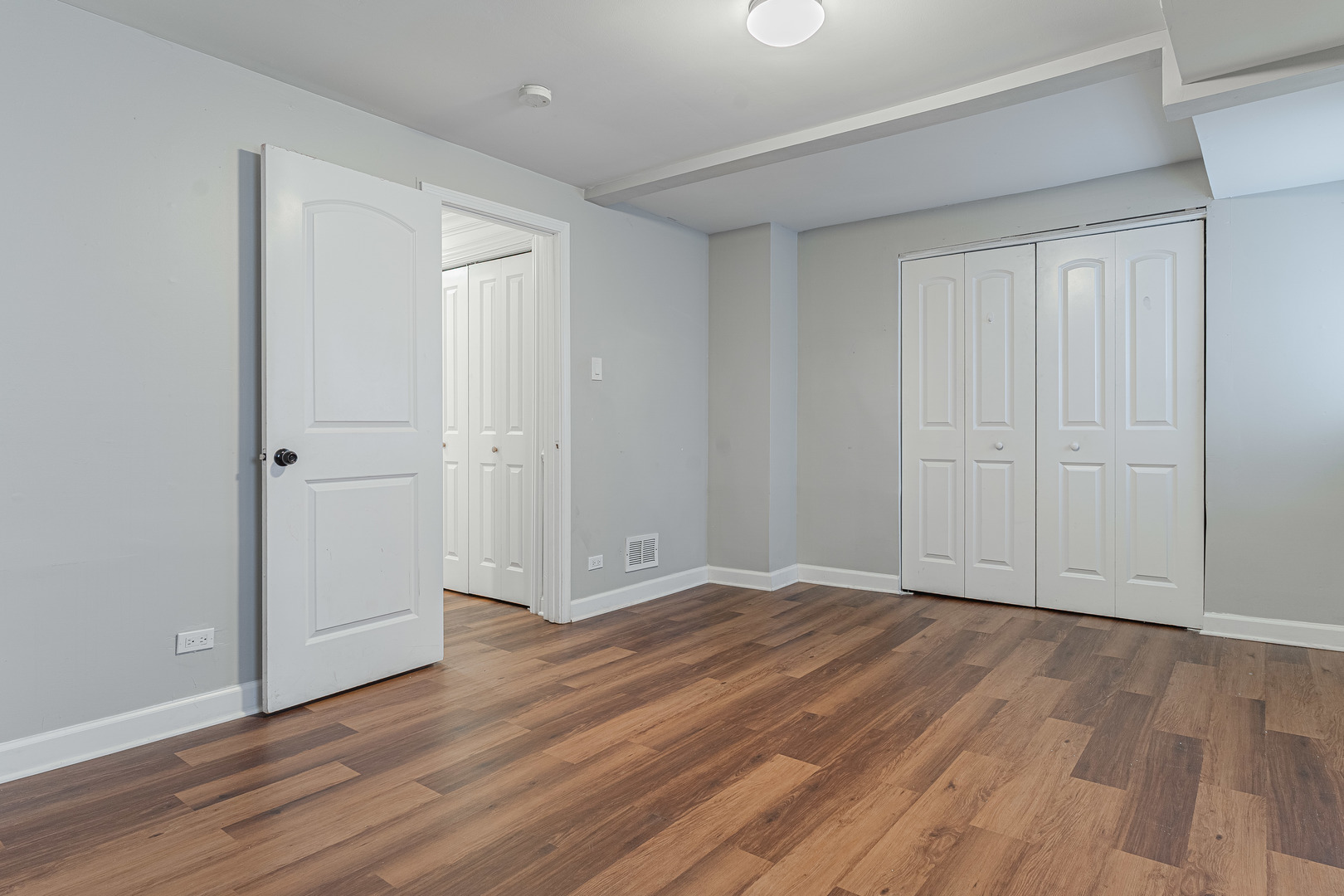 10528 South Aberdeen Street Chicago, IL 60643 - Photo 27 of 33 a view of an empty room with wooden floor