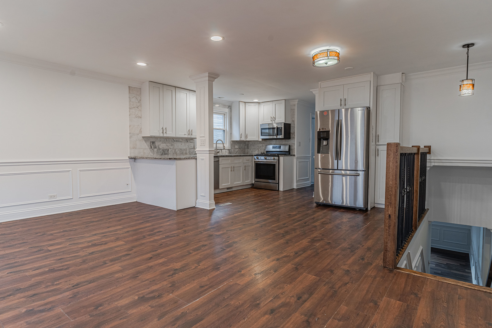 10528 South Aberdeen Street Chicago, IL 60643 - Photo 7 of 33 a kitchen with stainless steel appliances a refrigerator and wooden floor