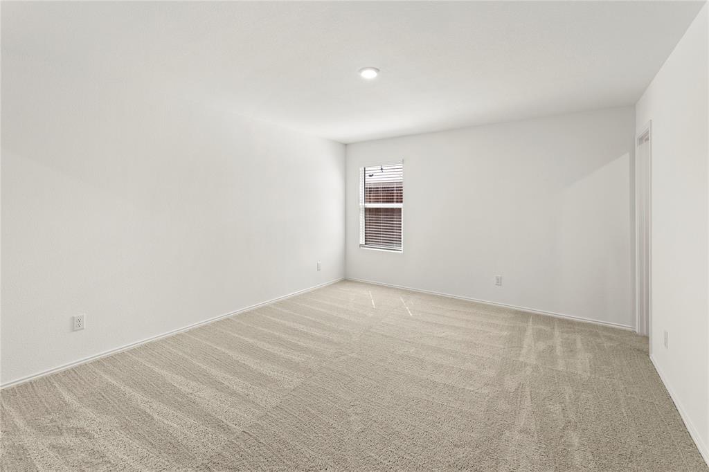 6101 Determine Forney, TX 75126 - Photo 8 of 13 a view of an empty room with a window