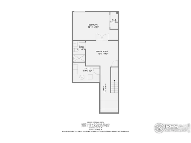 a view of a lush green hillside and a houses