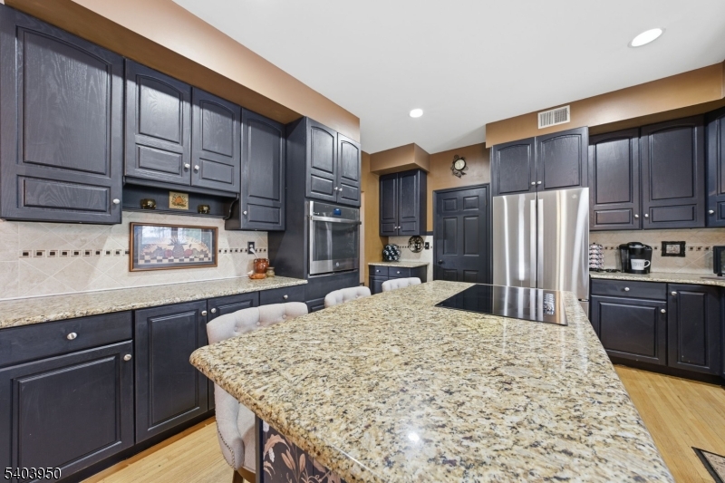 1 Worthington Road Columbia, NJ 07832 - Photo 12 of 50 a kitchen with stainless steel appliances granite countertop wooden cabinets a stove a sink and dishwasher