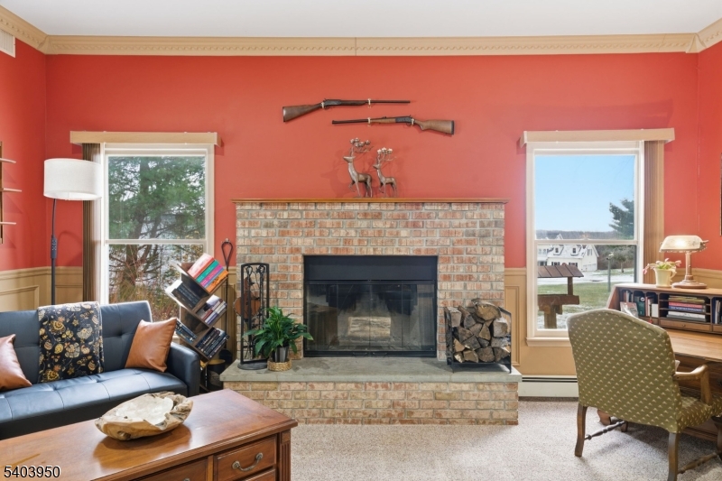 1 Worthington Road Columbia, NJ 07832 - Photo 18 of 50 a living room with furniture and a fireplace