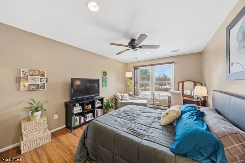 1 Worthington Road Columbia, NJ 07832 - Photo 27 of 50 a bed room with a bed a television and a large window