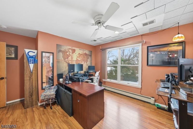 1 Worthington Road Columbia, NJ 07832 - Photo 29 of 50 a room with furniture large window with wooden floor