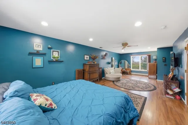 a bed room with two bed and a couch