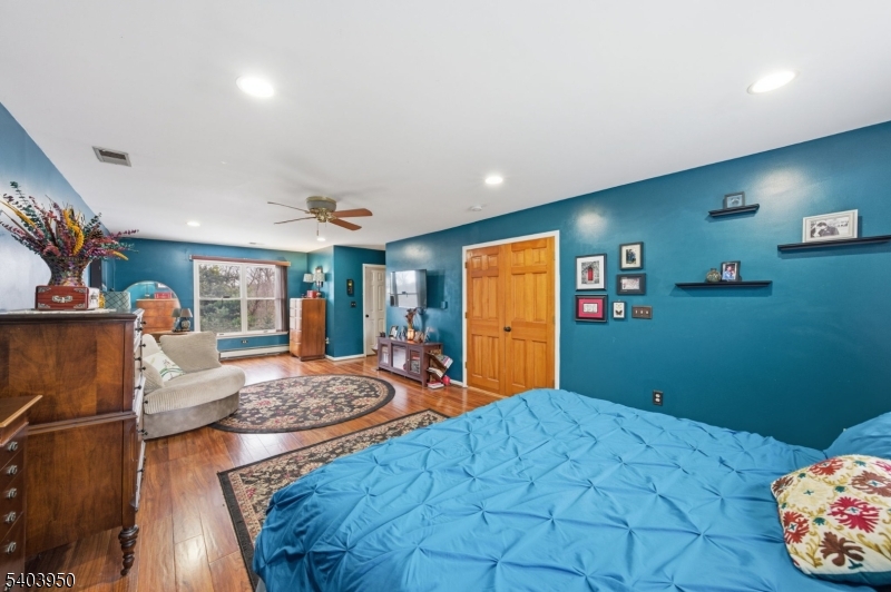 1 Worthington Road Columbia, NJ 07832 - Photo 35 of 50 a bed room with a bed and a tv